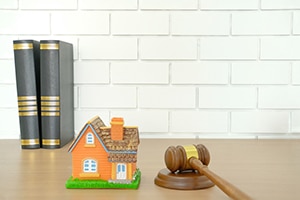 Small house with judge's gavel